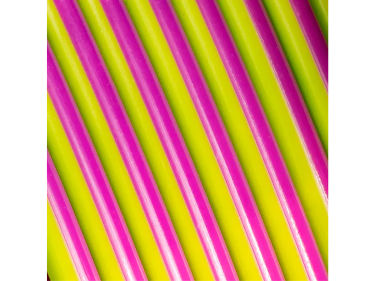 Polymaker Panchroma PLA Dual Silk Filament in vibrant aubergine and green colors with a silky sheen.