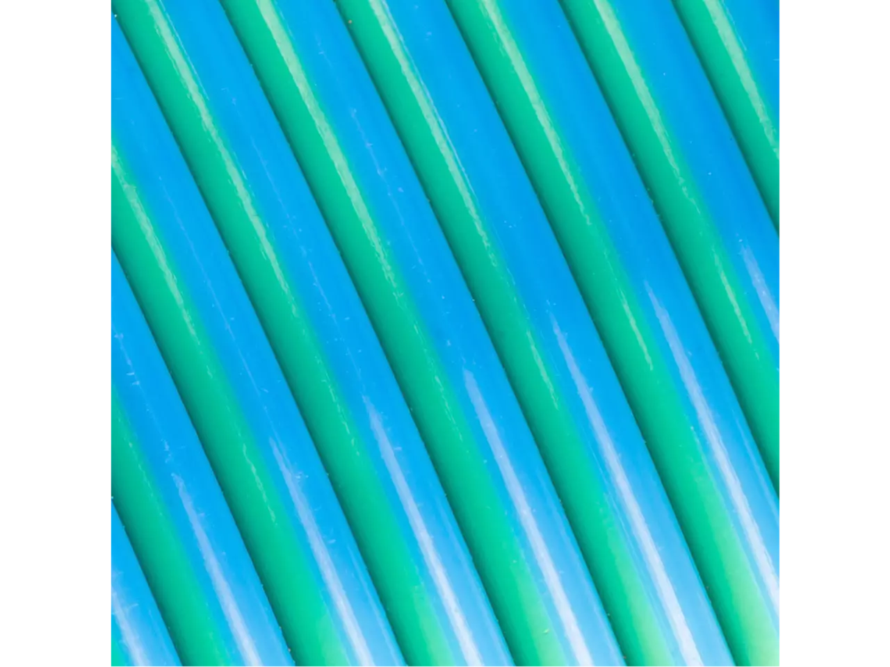 Polymaker Panchroma PLA Dual Silk Filament in Caribbean Sea color, showcasing smooth gradients and glossy finish.