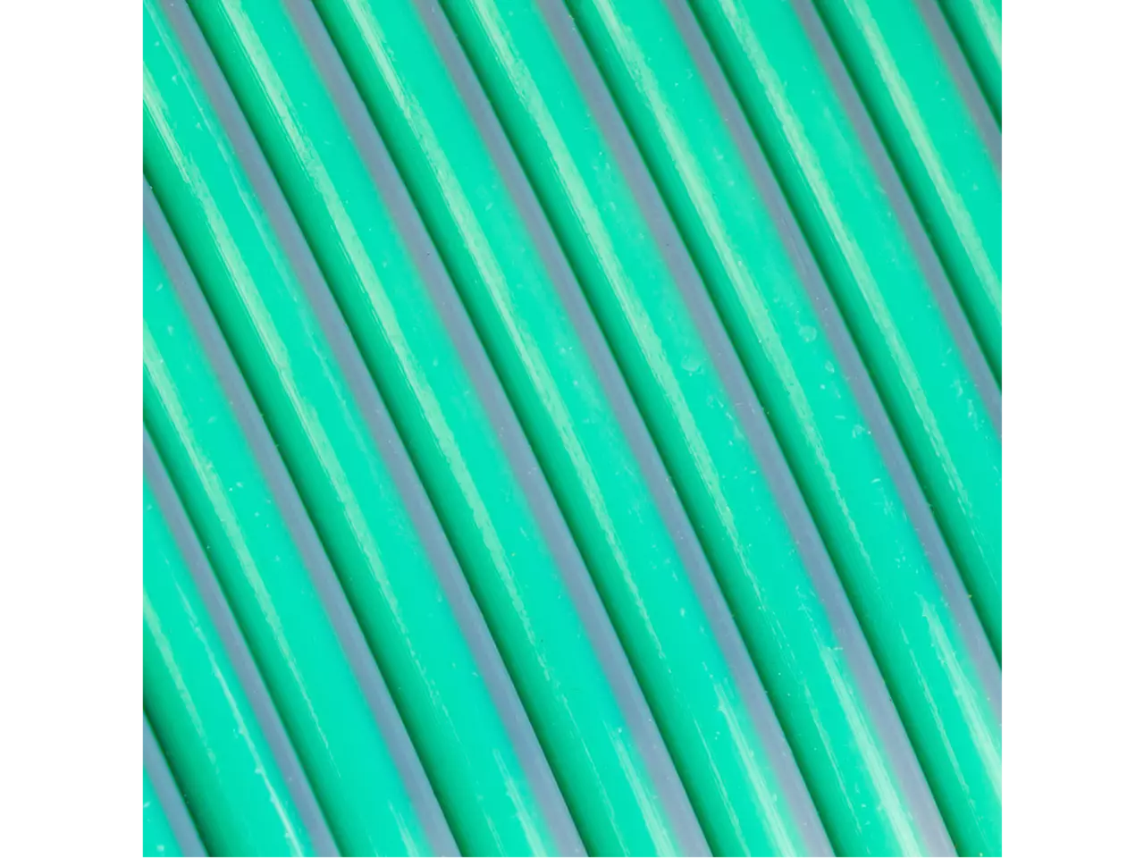 Polymaker Panchroma PLA Dual Silk Filament in jadeite color, showcasing its smooth glossy finish and vibrant dual tones.