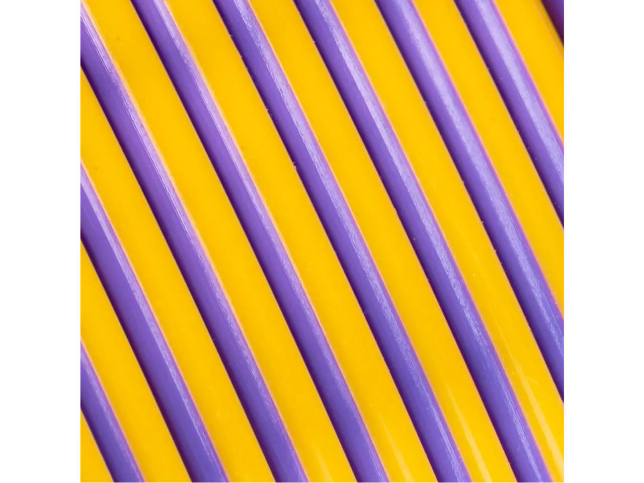 Polymaker Panchroma PLA Dual Silk Filament in Sovereign color with smooth, glossy finish on a yellow and purple background.