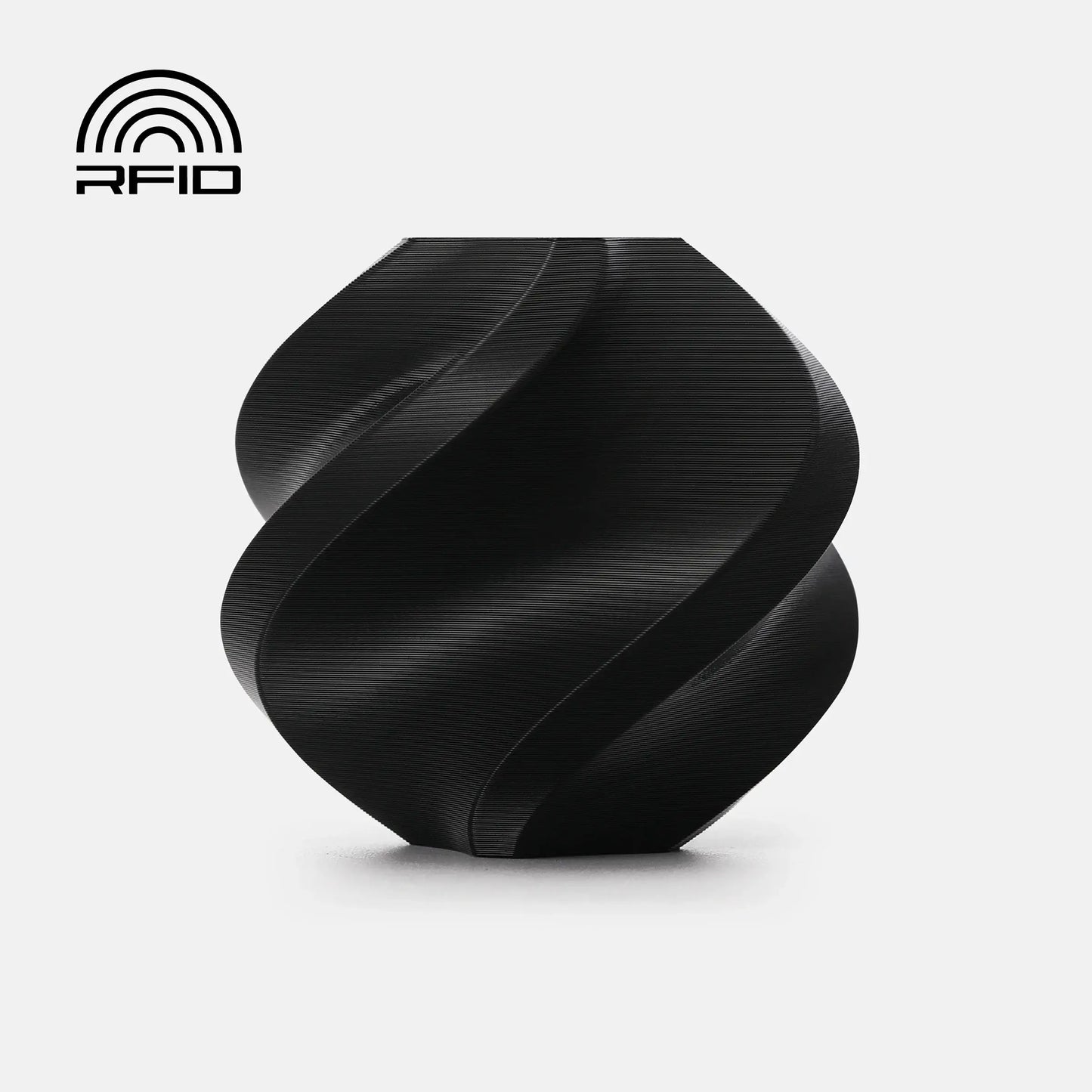 RFID-Tag in schwarzer, gewundener Form mit glänzender Oberfläche, ideal für innovative Anwendungen.