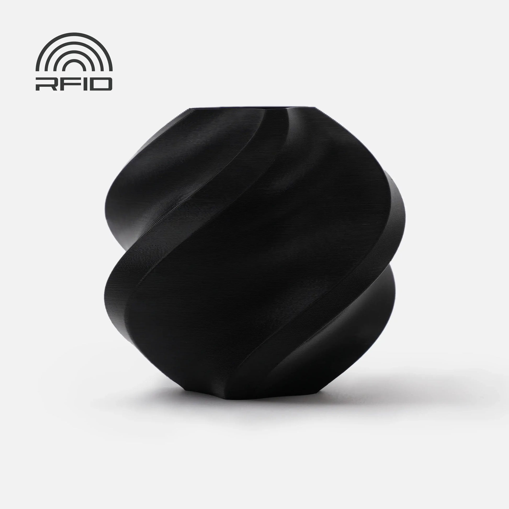 Schwarze gedrehte Vase aus Bambu Lab PLA Basic, ideal für 3D-Druckprojekte.
